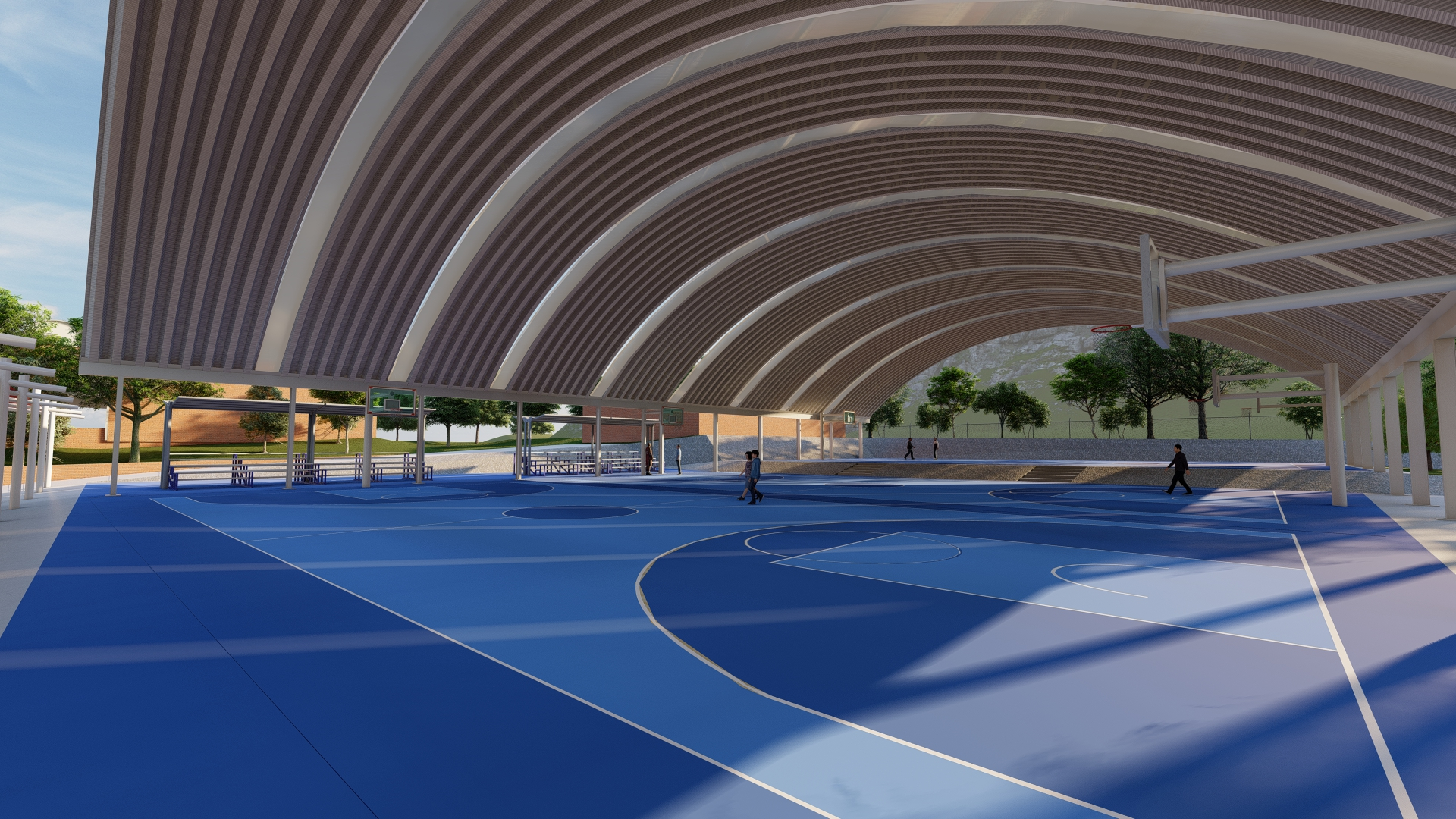 cubierta autosoportante tipo arcotecho en cancha deportiva de basketball vista de frente en instituto mater en monterrey, nuevo leon